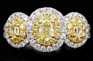 18K Gold 1.50 Carat Total Weight Fancy Yellow Oval Diamond Halo Engagement Ring