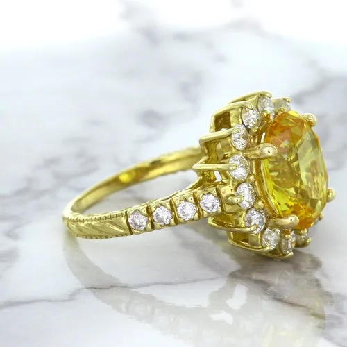4.04ct Oval Yellow Sapphire Ring with Diamond Halo in 14K Yellow Gold