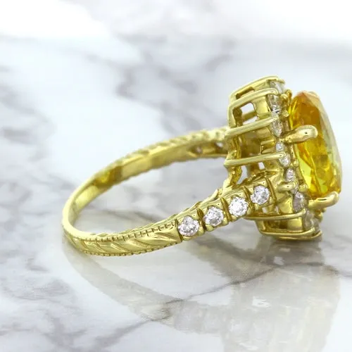 4.04ct Oval Yellow Sapphire Ring with Diamond Halo in 14K Yellow Gold