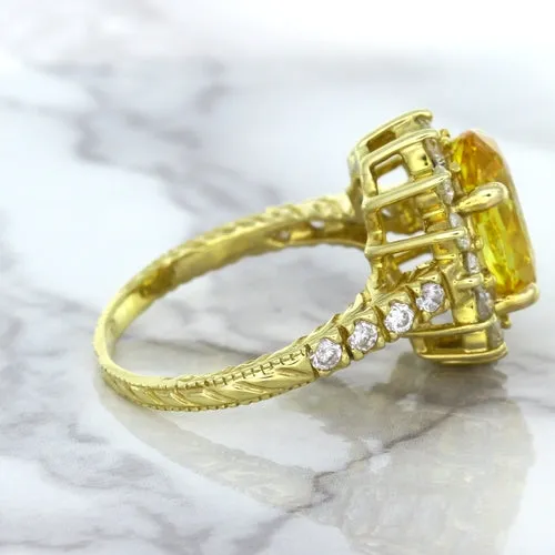 4.04ct Oval Yellow Sapphire Ring with Diamond Halo in 14K Yellow Gold