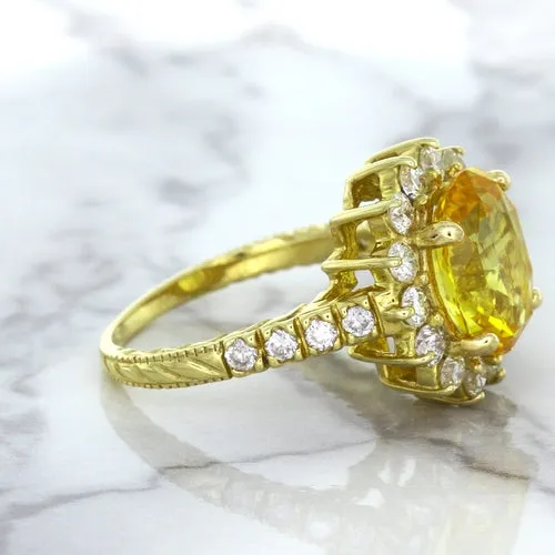 4.04ct Oval Yellow Sapphire Ring with Diamond Halo in 14K Yellow Gold
