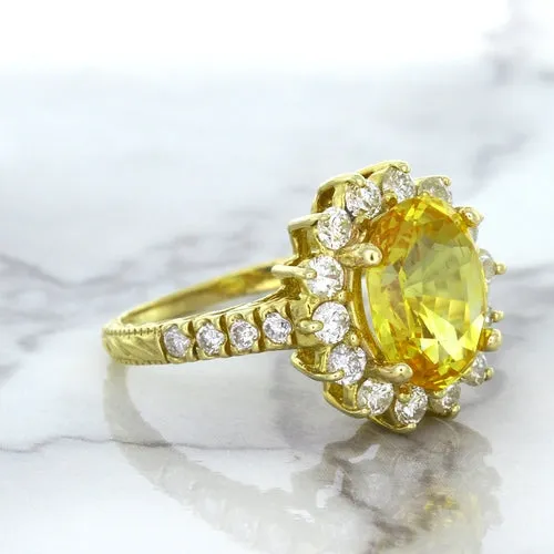4.04ct Oval Yellow Sapphire Ring with Diamond Halo in 14K Yellow Gold