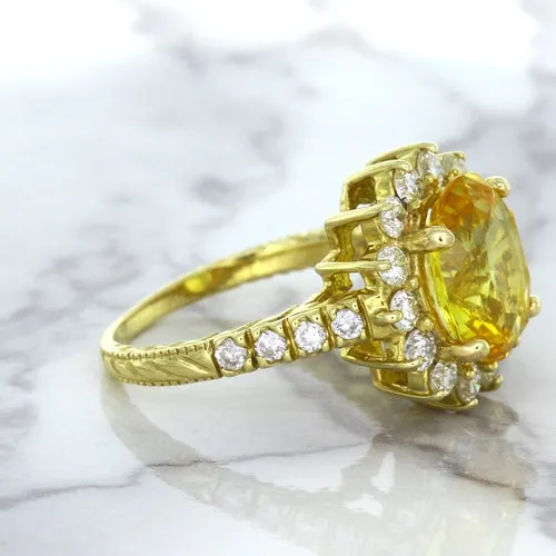 4.04ct Oval Yellow Sapphire Ring with Diamond Halo in 14K Yellow Gold