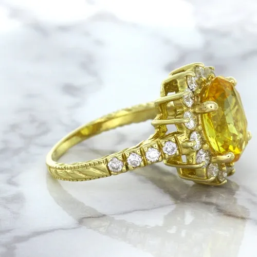 4.04ct Oval Yellow Sapphire Ring with Diamond Halo in 14K Yellow Gold