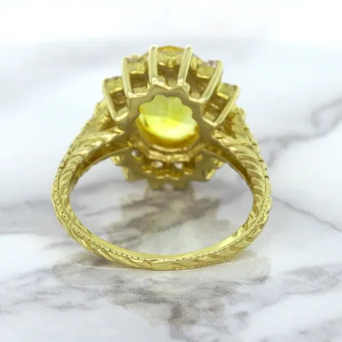 4.04ct Oval Yellow Sapphire Ring with Diamond Halo in 14K Yellow Gold