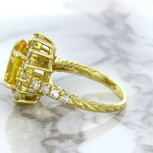 4.04ct Oval Yellow Sapphire Ring with Diamond Halo in 14K Yellow Gold