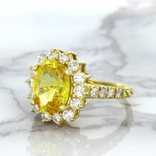 4.04ct Oval Yellow Sapphire Ring with Diamond Halo in 14K Yellow Gold