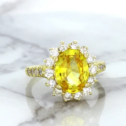 4.04ct Oval Yellow Sapphire Ring with Diamond Halo in 14K Yellow Gold