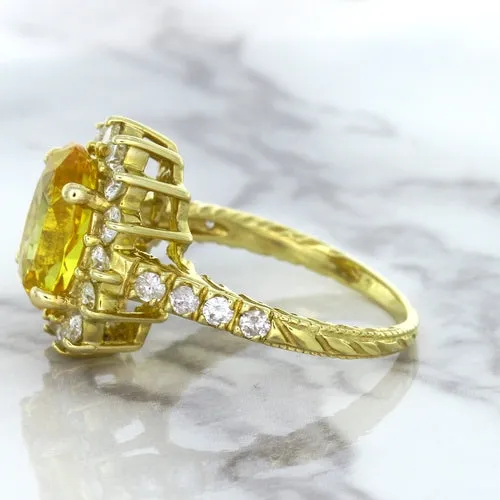 4.04ct Oval Yellow Sapphire Ring with Diamond Halo in 14K Yellow Gold