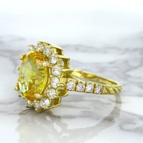 4.04ct Oval Yellow Sapphire Ring with Diamond Halo in 14K Yellow Gold