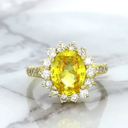 4.04ct Oval Yellow Sapphire Ring with Diamond Halo in 14K Yellow Gold