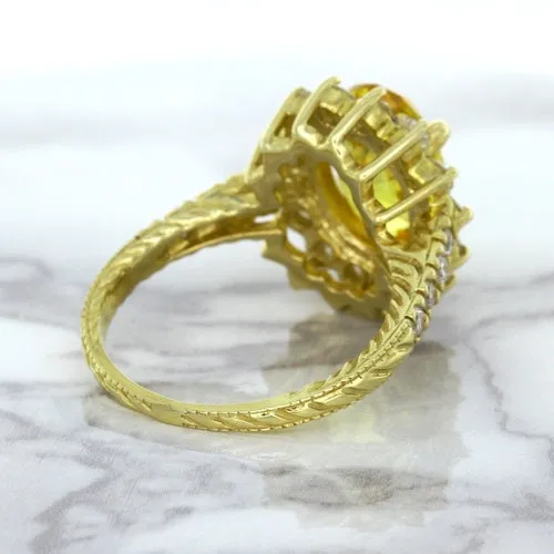 4.04ct Oval Yellow Sapphire Ring with Diamond Halo in 14K Yellow Gold