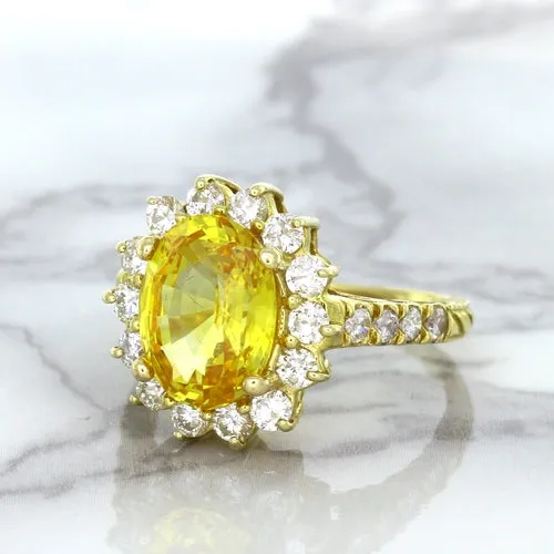 4.04ct Oval Yellow Sapphire Ring with Diamond Halo in 14K Yellow Gold