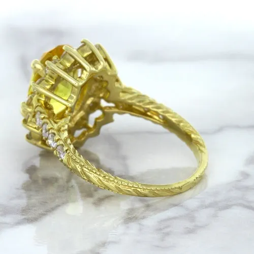 4.04ct Oval Yellow Sapphire Ring with Diamond Halo in 14K Yellow Gold