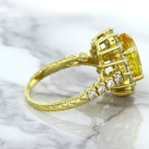 4.04ct Oval Yellow Sapphire Ring with Diamond Halo in 14K Yellow Gold