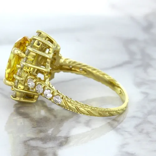 4.04ct Oval Yellow Sapphire Ring with Diamond Halo in 14K Yellow Gold