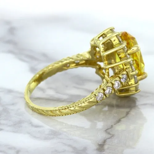4.04ct Oval Yellow Sapphire Ring with Diamond Halo in 14K Yellow Gold