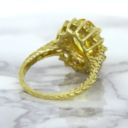 4.04ct Oval Yellow Sapphire Ring with Diamond Halo in 14K Yellow Gold