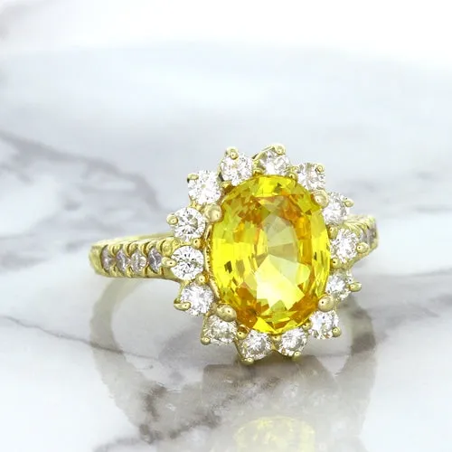 4.04ct Oval Yellow Sapphire Ring with Diamond Halo in 14K Yellow Gold
