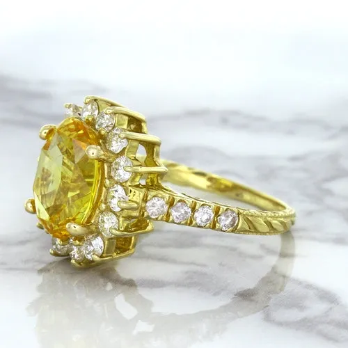 4.04ct Oval Yellow Sapphire Ring with Diamond Halo in 14K Yellow Gold