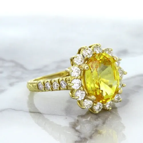 4.04ct Oval Yellow Sapphire Ring with Diamond Halo in 14K Yellow Gold