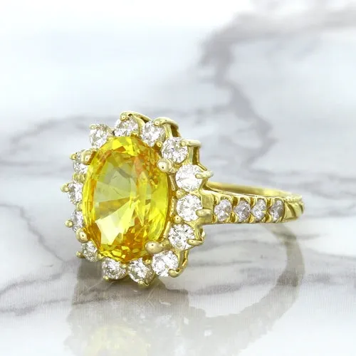 4.04ct Oval Yellow Sapphire Ring with Diamond Halo in 14K Yellow Gold