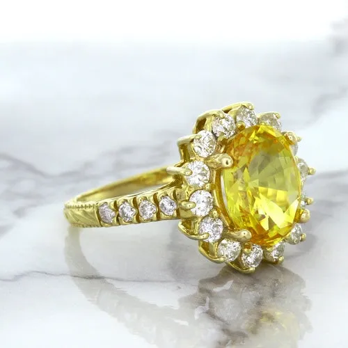 4.04ct Oval Yellow Sapphire Ring with Diamond Halo in 14K Yellow Gold