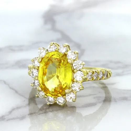 4.04ct Oval Yellow Sapphire Ring with Diamond Halo in 14K Yellow Gold