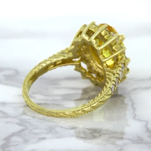 4.04ct Oval Yellow Sapphire Ring with Diamond Halo in 14K Yellow Gold