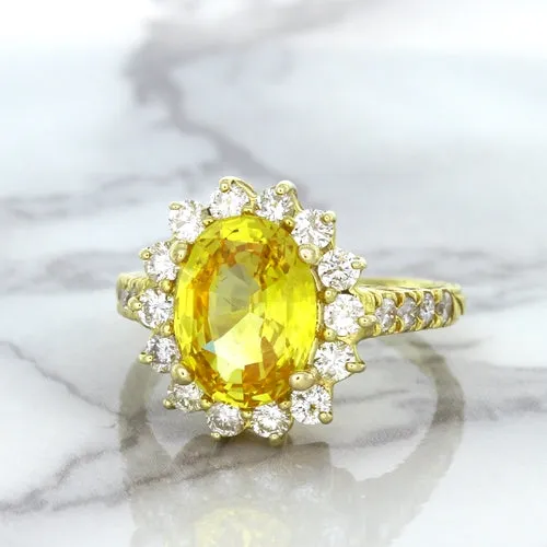 4.04ct Oval Yellow Sapphire Ring with Diamond Halo in 14K Yellow Gold