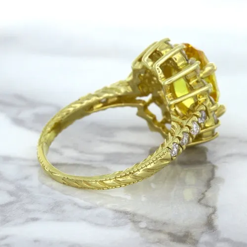 4.04ct Oval Yellow Sapphire Ring with Diamond Halo in 14K Yellow Gold