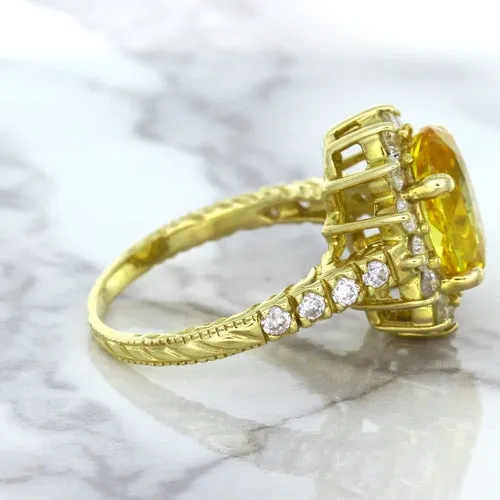 4.04ct Oval Yellow Sapphire Ring with Diamond Halo in 14K Yellow Gold