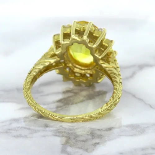 4.04ct Oval Yellow Sapphire Ring with Diamond Halo in 14K Yellow Gold