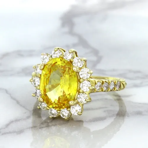 4.04ct Oval Yellow Sapphire Ring with Diamond Halo in 14K Yellow Gold
