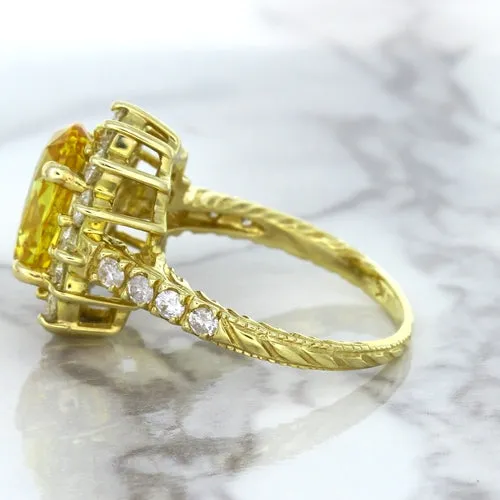 4.04ct Oval Yellow Sapphire Ring with Diamond Halo in 14K Yellow Gold