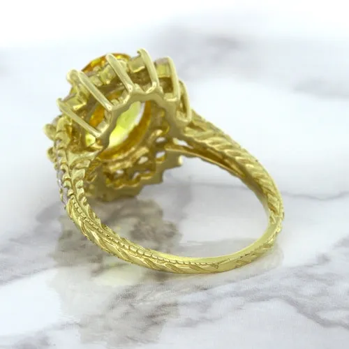 4.04ct Oval Yellow Sapphire Ring with Diamond Halo in 14K Yellow Gold