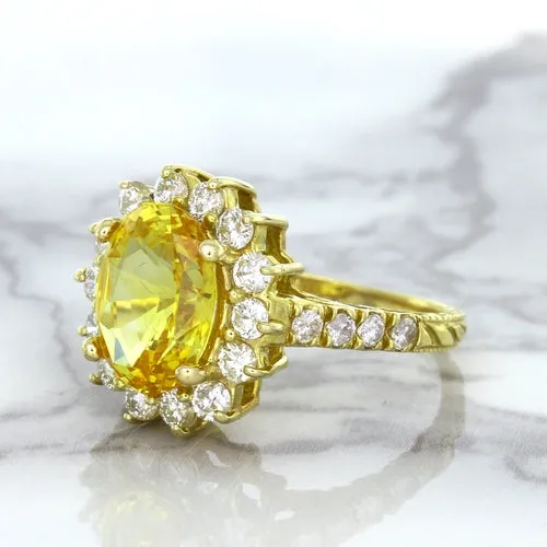 4.04ct Oval Yellow Sapphire Ring with Diamond Halo in 14K Yellow Gold