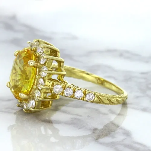 4.04ct Oval Yellow Sapphire Ring with Diamond Halo in 14K Yellow Gold