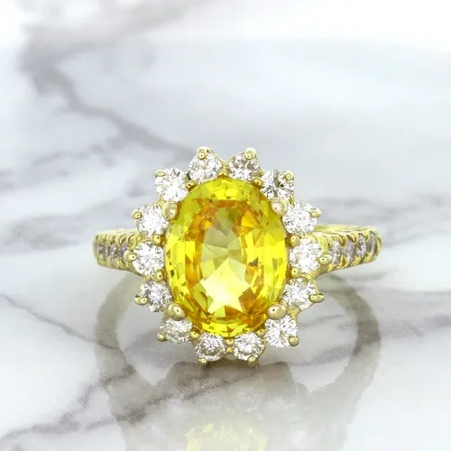 4.04ct Oval Yellow Sapphire Ring with Diamond Halo in 14K Yellow Gold