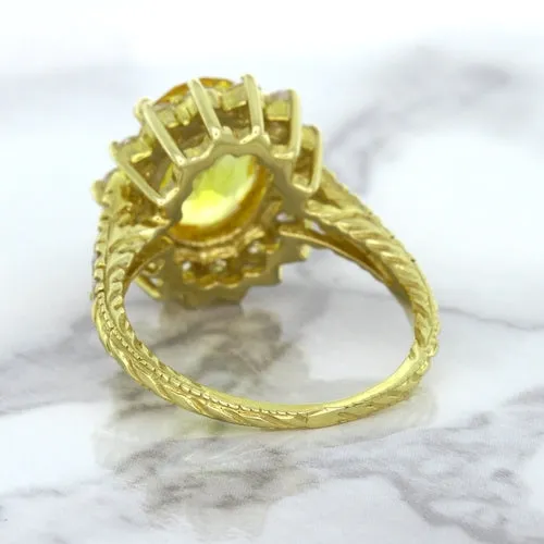 4.04ct Oval Yellow Sapphire Ring with Diamond Halo in 14K Yellow Gold