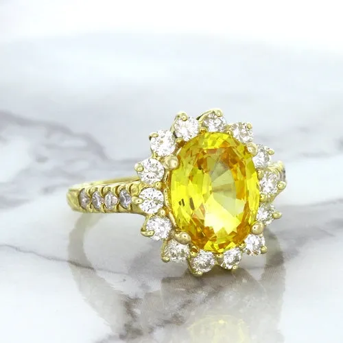 4.04ct Oval Yellow Sapphire Ring with Diamond Halo in 14K Yellow Gold