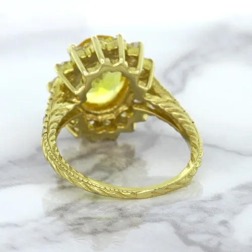 4.04ct Oval Yellow Sapphire Ring with Diamond Halo in 14K Yellow Gold