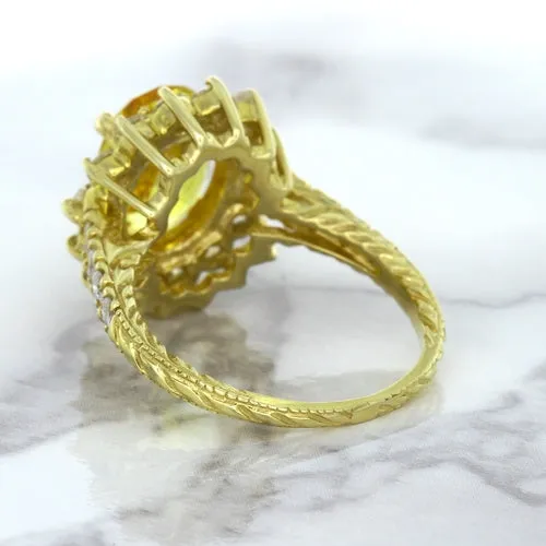 4.04ct Oval Yellow Sapphire Ring with Diamond Halo in 14K Yellow Gold