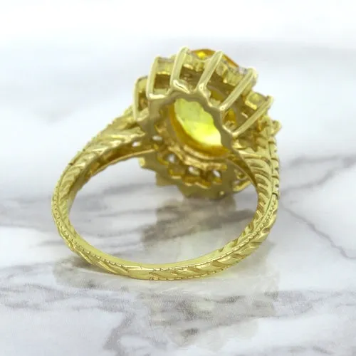 4.04ct Oval Yellow Sapphire Ring with Diamond Halo in 14K Yellow Gold