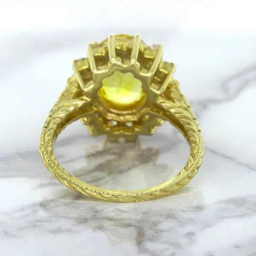 4.04ct Oval Yellow Sapphire Ring with Diamond Halo in 14K Yellow Gold