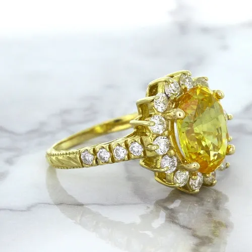 4.04ct Oval Yellow Sapphire Ring with Diamond Halo in 14K Yellow Gold