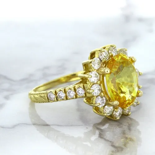 4.04ct Oval Yellow Sapphire Ring with Diamond Halo in 14K Yellow Gold