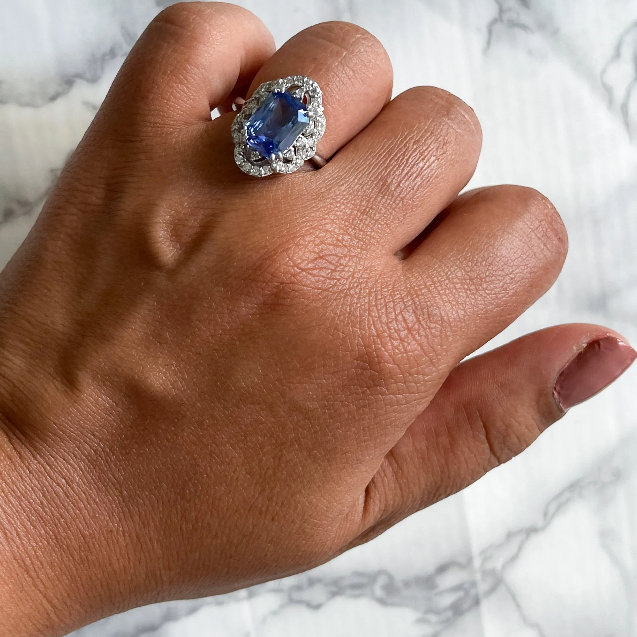 4.37ct Radiant Blue Sapphire Ring with Diamond Halo in Platinum