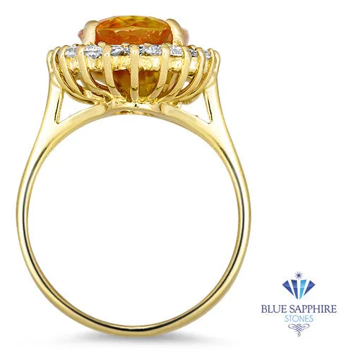 6.61ct Oval Orange Sapphire Ring with Diamond Halo in 14K Yellow Gold