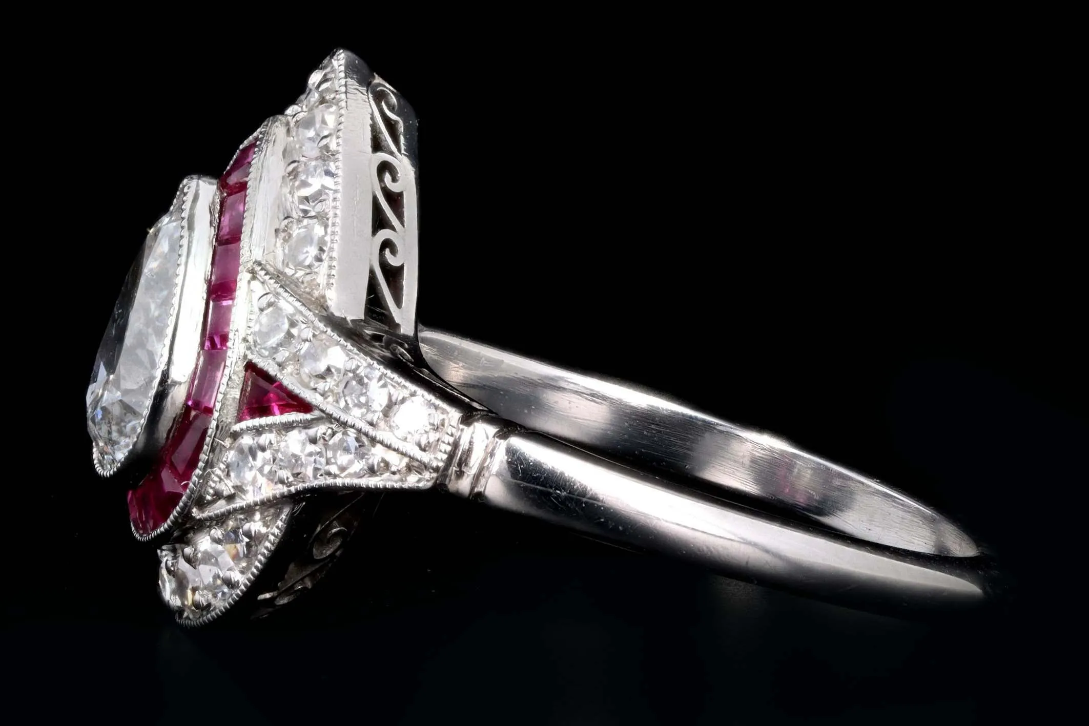 Art Deco Inspired .76 Carat Pear Cut Diamond & Natural Ruby Halo Engagement Ring